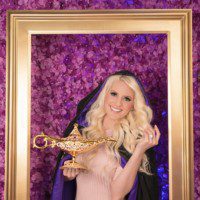 Once Upon an Escape - Kendra in a picture frame holding a magic genie's lamp