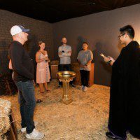 Once Upon an Escape - Group of people getting the story