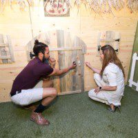 Once Upon an Escape - Man & Woman solving a puzzle